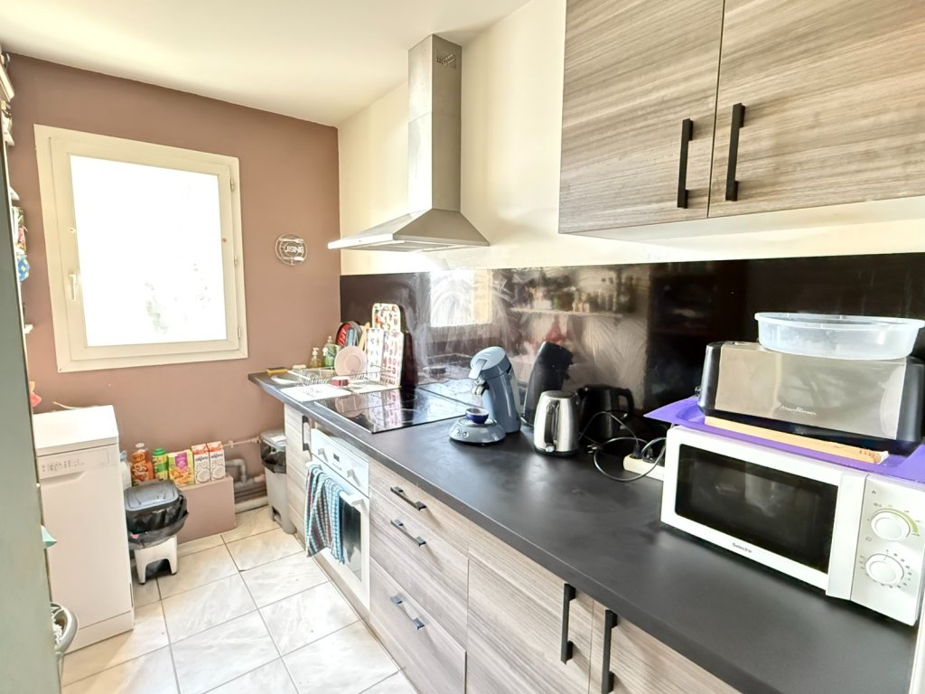 Appartement F3 + jardin +  parking - VERNEUIL L ETANG - 62.86 m2 - VENDU